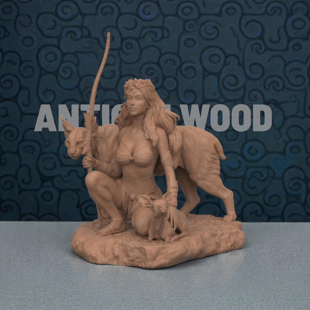 3D-printed Artemis figurine featuring a kneeling huntress goddess holding a staff, accompanied by a large wild cat and a small deer. The sculpt showcases flowing hair, detailed armor, and a natural rocky base, capturing the mythological figure’s serene yet powerful presence.