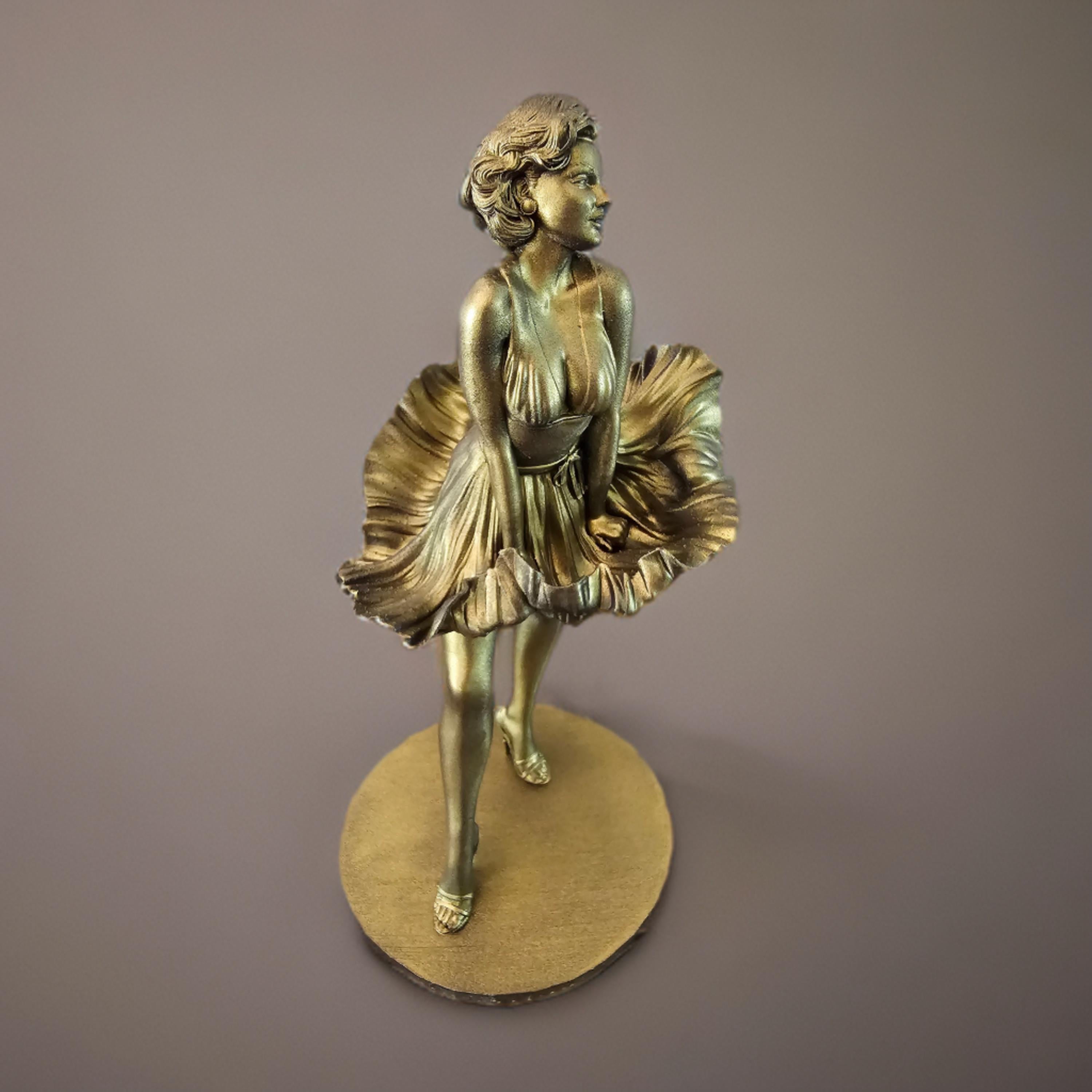 Statue of Marilyn Monroe, capturing her iconic pose with her dress flowing upward, exuding timeless elegance and charm.