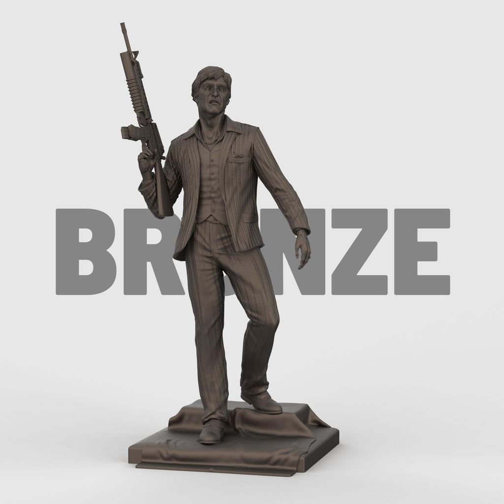 3D-printed statue inspired by Scarface, depicting a suited man in a confident pose, holding an assault rifle over his shoulder. The figure wears a detailed pinstripe suit and stands atop a textured base, capturing a bold and iconic cinematic moment with lifelike facial expression and dynamic stance.