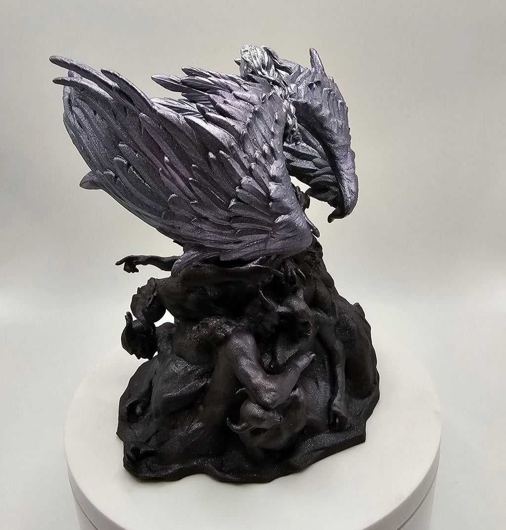 Sculpture of an angel with wide wings sitting atop a mound of intertwined figures representing darkness, depicted in intricate detail.