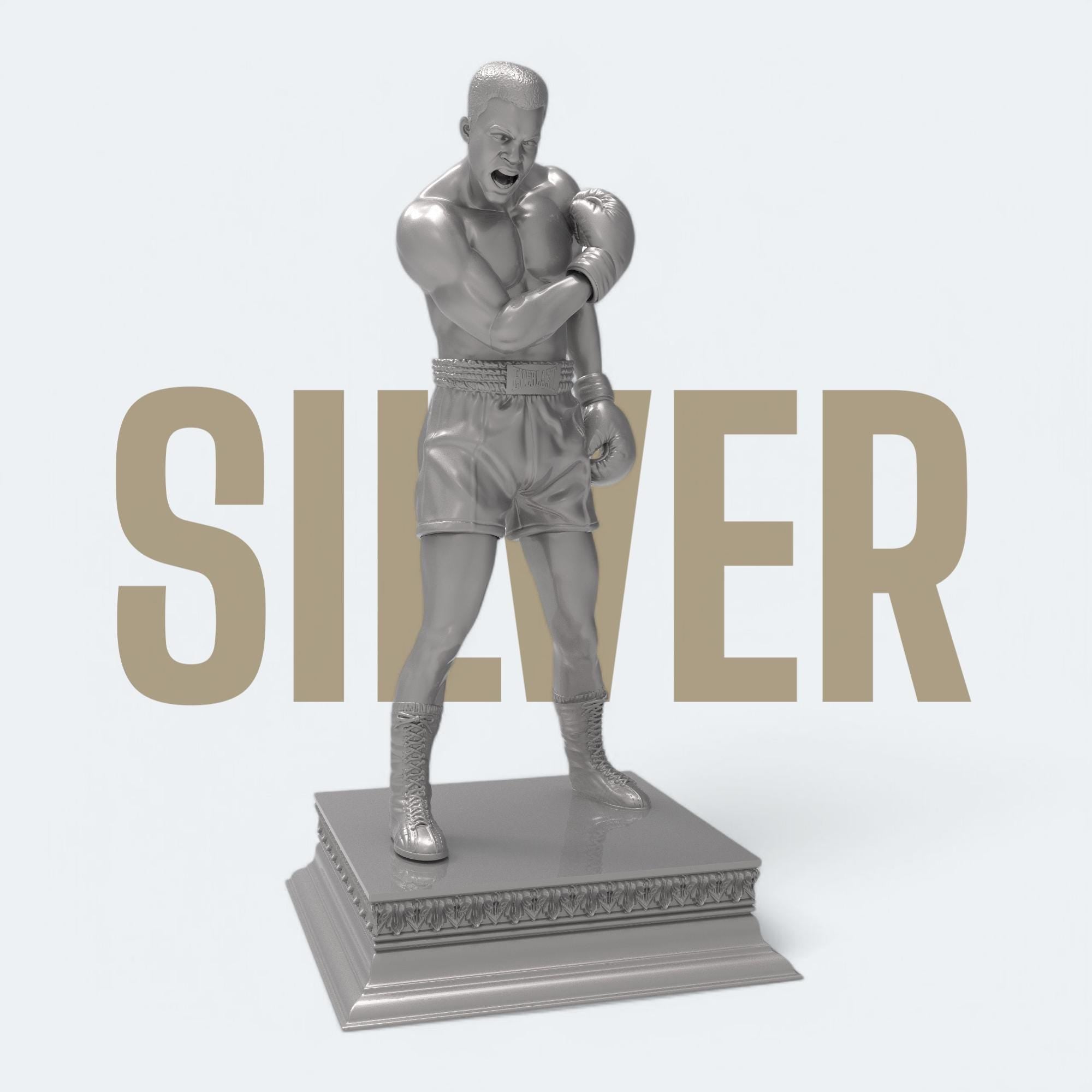 A bold tribute to the greatest of all time—this Muhammad Ali sculpture captures the raw strength and iconic energy of the boxing legend. With gloves raised and stance powerful, it’s a perfect piece for fans, collectors, and champions at heart. Available in gold and bronze finishes.