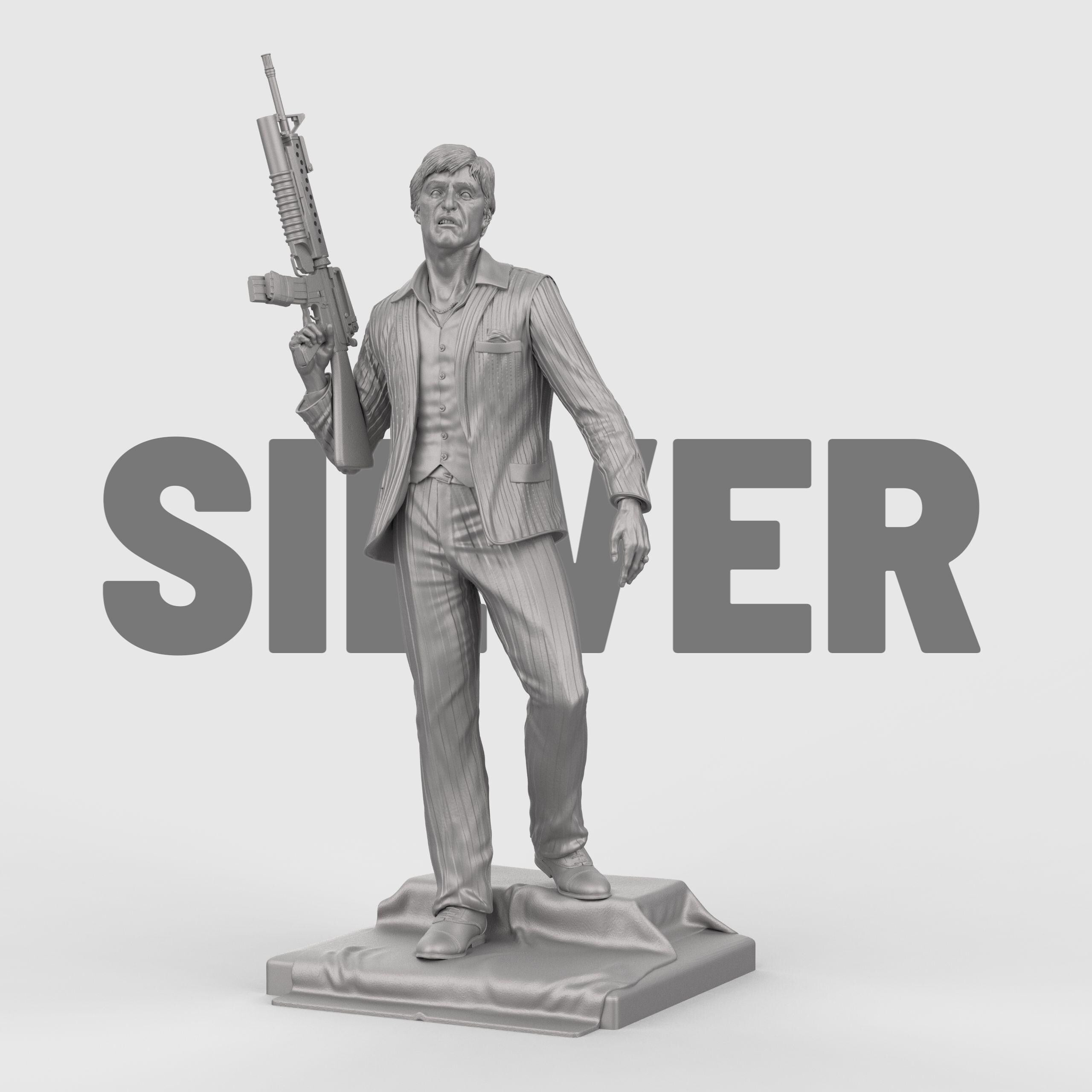 3D-printed statue inspired by Scarface, depicting a suited man in a confident pose, holding an assault rifle over his shoulder. The figure wears a detailed pinstripe suit and stands atop a textured base, capturing a bold and iconic cinematic moment with lifelike facial expression and dynamic stance.