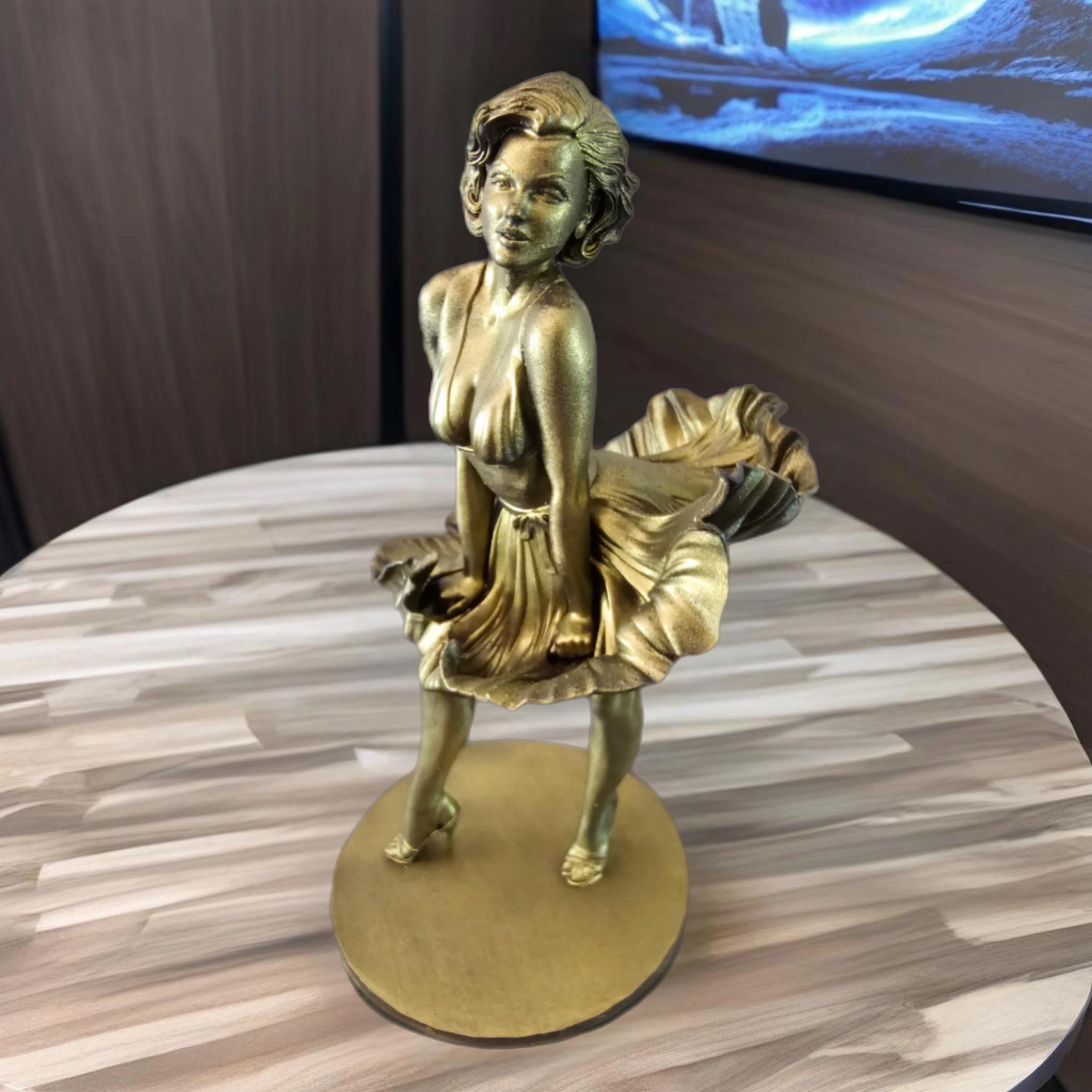 Statue of Marilyn Monroe, capturing her iconic pose with her dress flowing upward, exuding timeless elegance and charm.