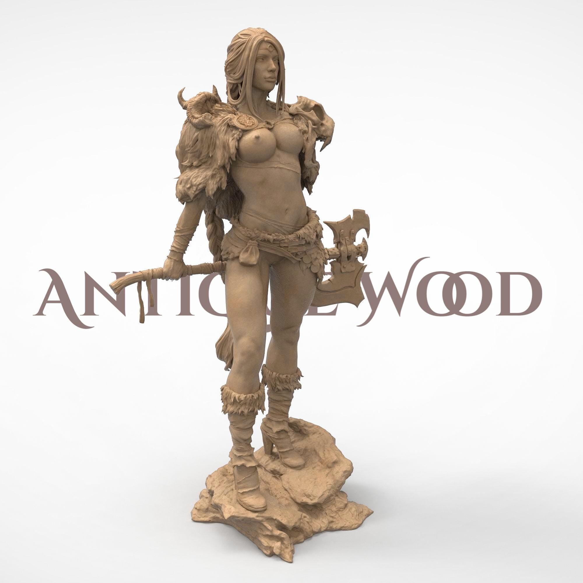 Embodying raw power and primal grace, Seraphyne the Untamed commands attention with every detail—from her battle-worn axe to the feral beauty of her fur-lined armor. A fierce guardian of nature and freedom, sculpted to stand tall in any collection.