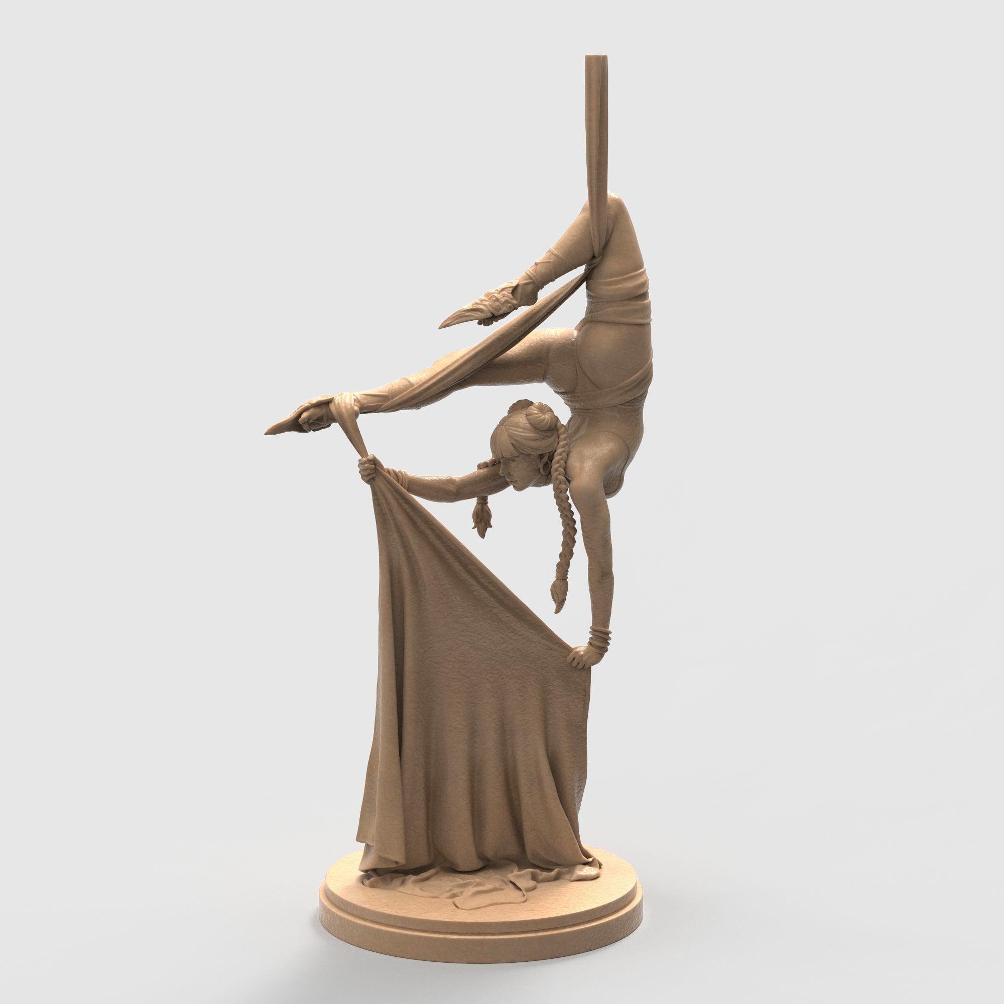 A breathtaking sculpture capturing the grace of aerial dance. The Dreamwoven balances midair, holding silken fabric in an elegant, contorted pose. Every curve and detail tells a story of strength, beauty, and poise—perfect for lovers of motion, fantasy, and fine artistry.