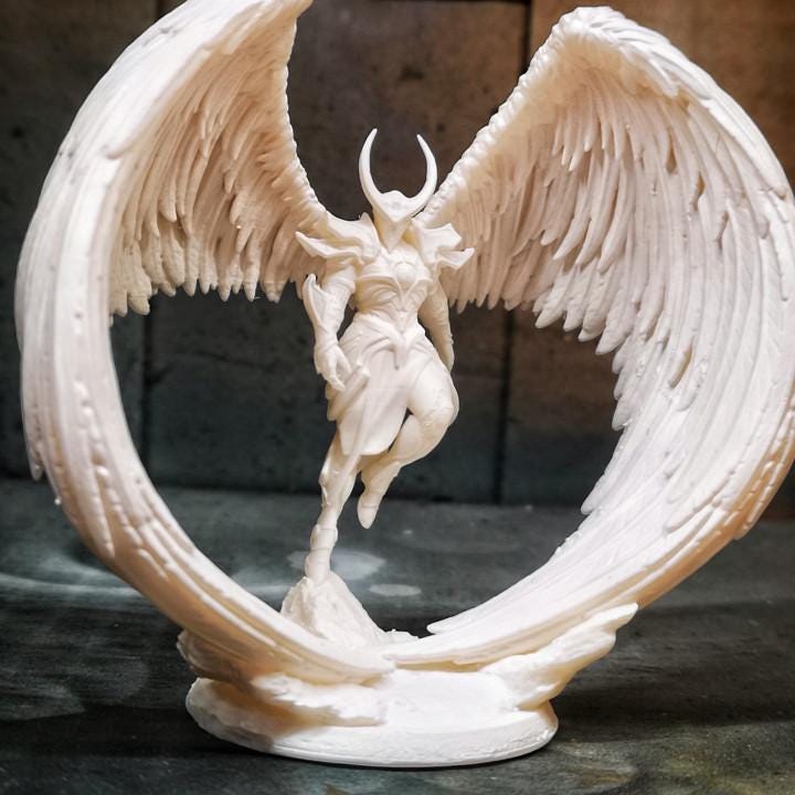 Angel Fighter, a celestial warrior with grand, curved wings, stands poised in elegant armor. With a horned helmet and flowing robes, this divine figure embodies power and grace. A stunning miniature for collectors and fantasy RPG enthusiasts.
