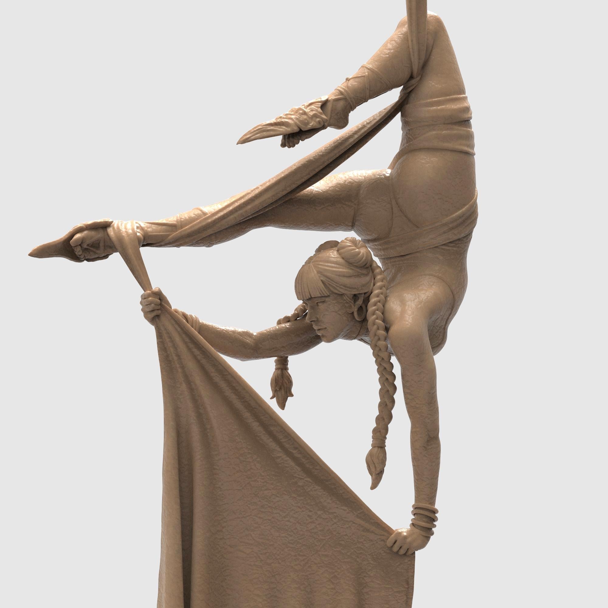 A breathtaking sculpture capturing the grace of aerial dance. The Dreamwoven balances midair, holding silken fabric in an elegant, contorted pose. Every curve and detail tells a story of strength, beauty, and poise—perfect for lovers of motion, fantasy, and fine artistry.