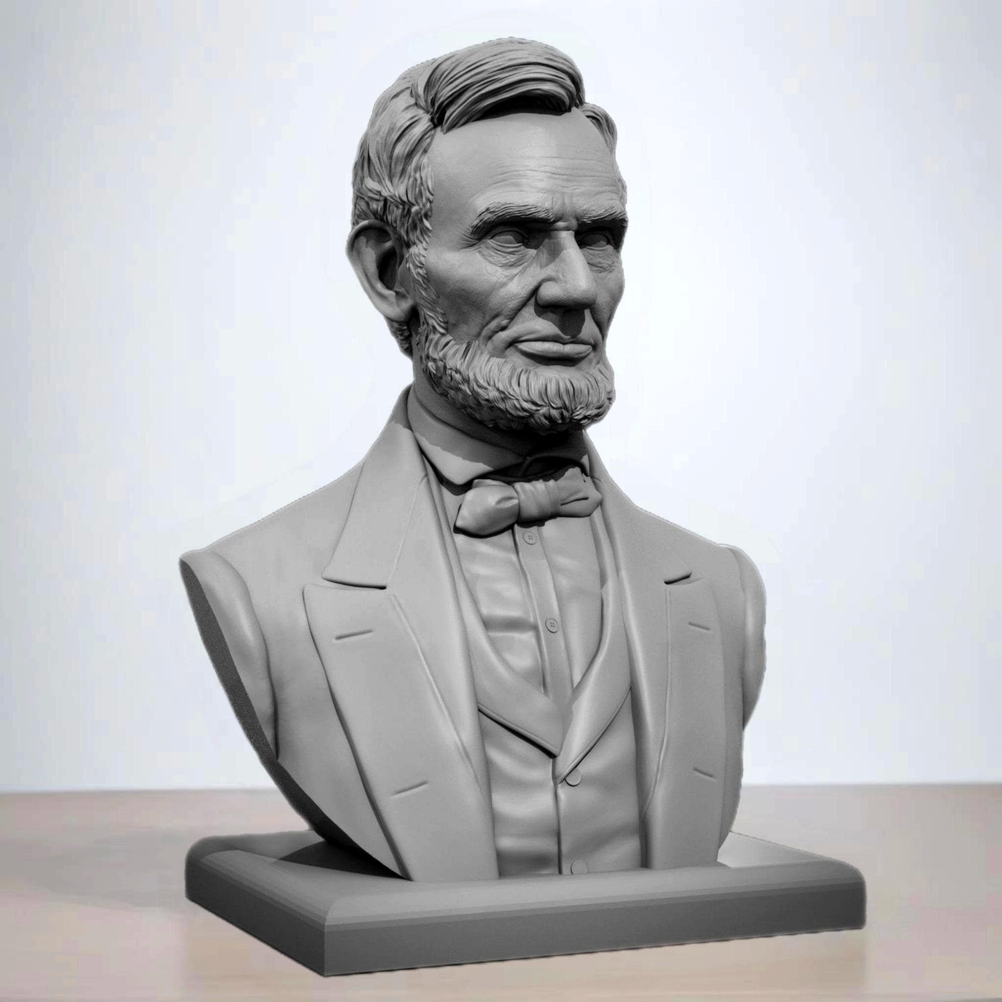 Statue of Abraham Lincoln in a detailed bust format, featuring his iconic beard and dressed in a formal suit with a bow tie, mounted on a rectangular base.