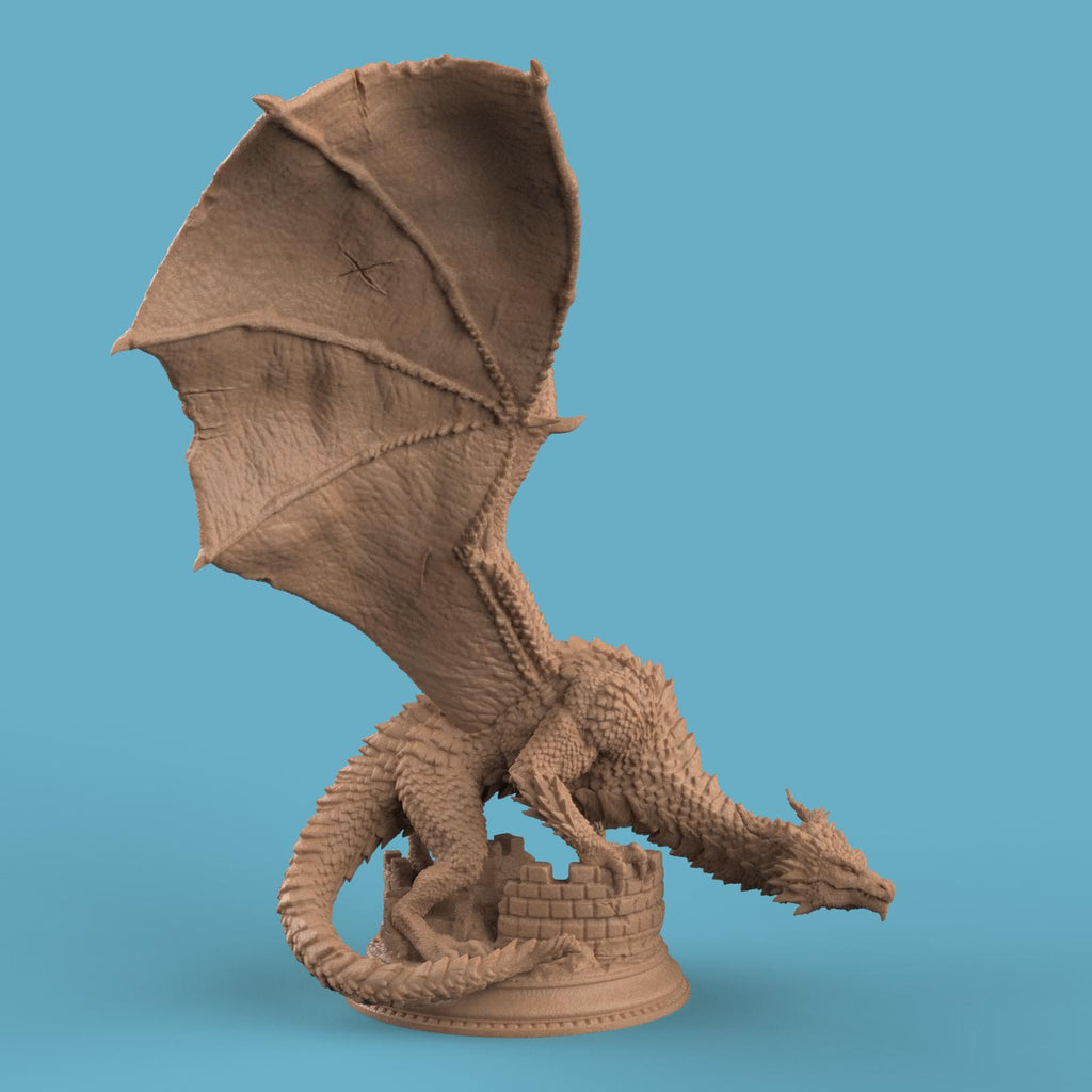3D-printed Azmordion Silver Dragon miniature with massive outstretched wings, detailed scales, and a coiled tail perched against a ruined stone wall. Fantasy dragon collectible perfect for tabletop games or display.