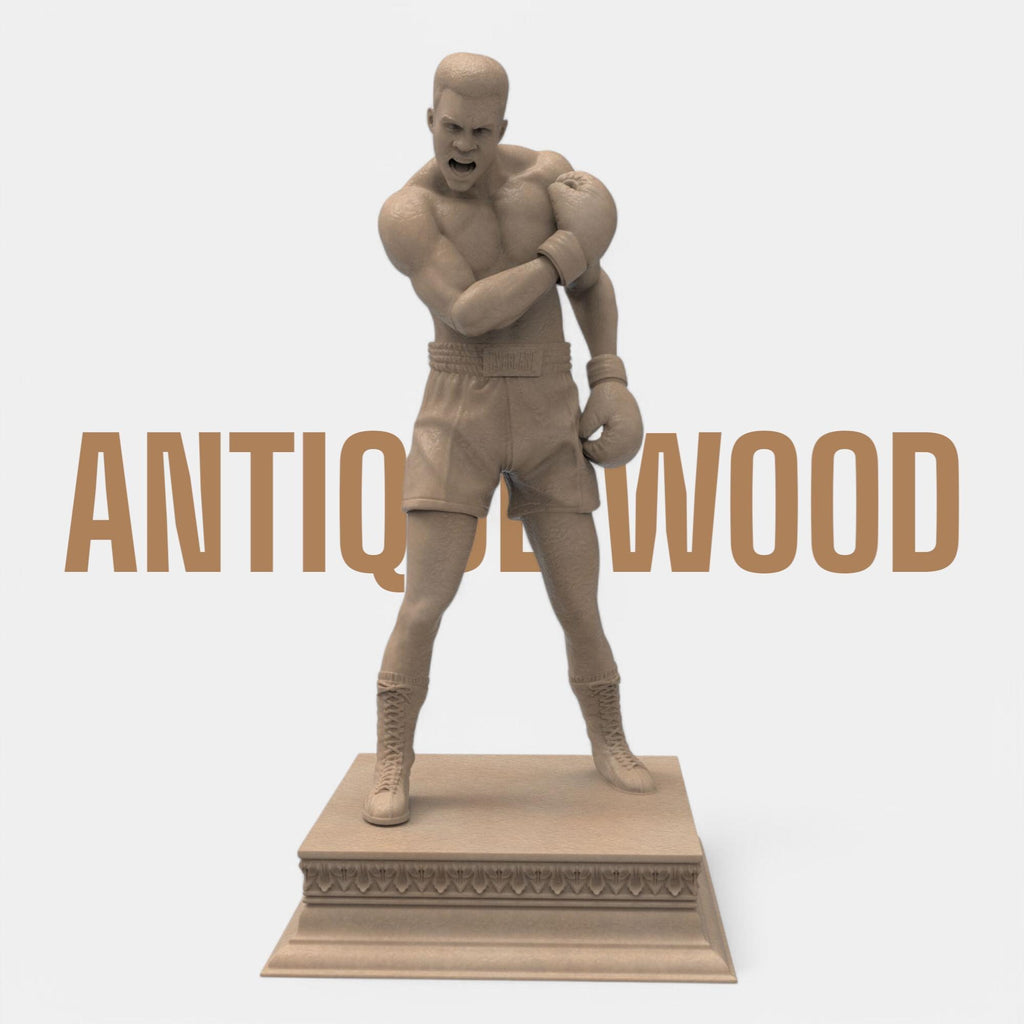 A bold tribute to the greatest of all time—this Muhammad Ali sculpture captures the raw strength and iconic energy of the boxing legend. With gloves raised and stance powerful, it’s a perfect piece for fans, collectors, and champions at heart. Available in gold and bronze finishes.