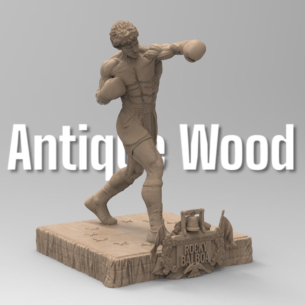 Rocky Balboa statuette capturing the iconic boxer in a powerful fighting stance. Features sculpted muscles, boxing gloves, and a detailed base with championship elements, embodying determination and resilience.
