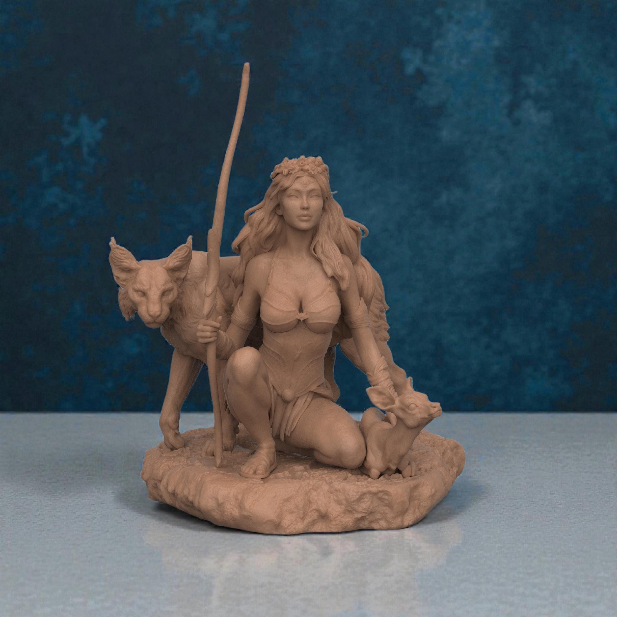 3D-printed Artemis figurine featuring a kneeling huntress goddess holding a staff, accompanied by a large wild cat and a small deer. The sculpt showcases flowing hair, detailed armor, and a natural rocky base, capturing the mythological figure’s serene yet powerful presence.