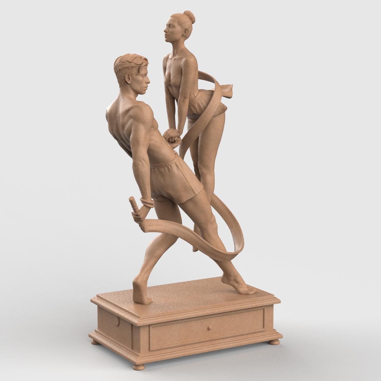 3D-printed figurine of a male and female dancer entwined with flowing ribbons, symbolizing harmony and balance. The male figure stands firm holding the ribbon while the female dancer rises gracefully on pointe, their hands interlocked. The dynamic ribbons encircle them, emphasizing movement and unity. Mounted on a rectangular decorative base.