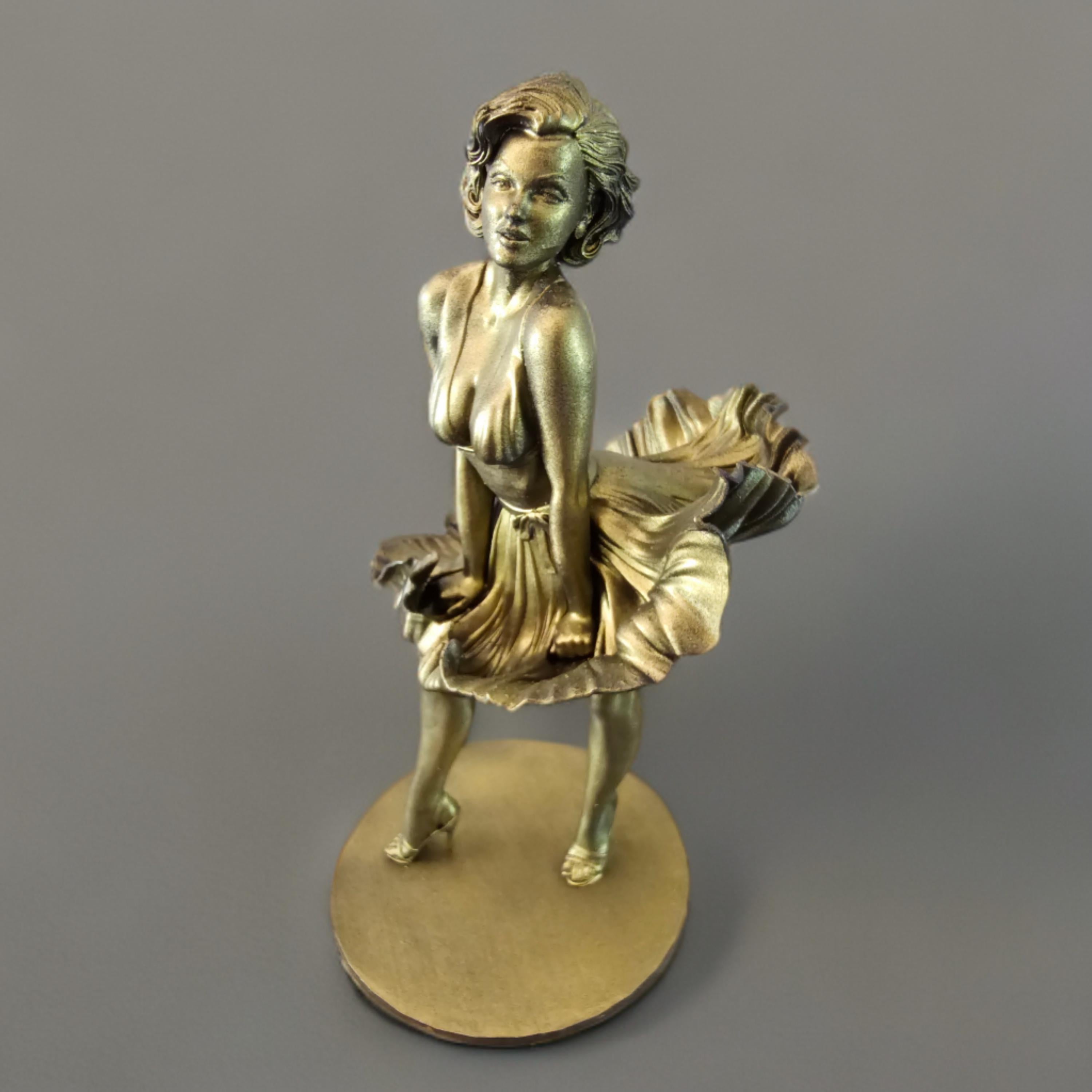 Statue of Marilyn Monroe, capturing her iconic pose with her dress flowing upward, exuding timeless elegance and charm.