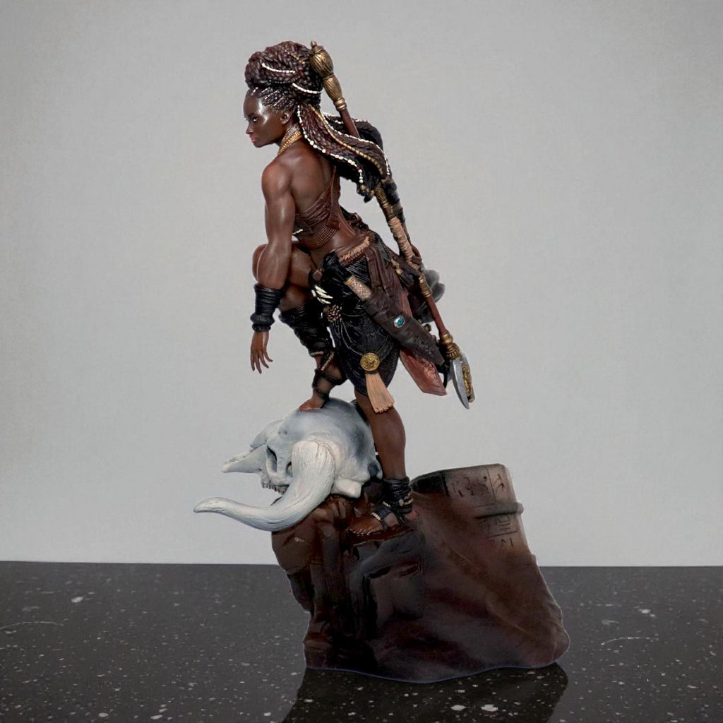 Elzebe, the Warrior Queen, stands atop a rocky skull, exuding strength and regality. Clad in intricate armor, her braided hair flows as she surveys the battlefield. A fierce leader, she embodies resilience and power, a true queen of war and legend.