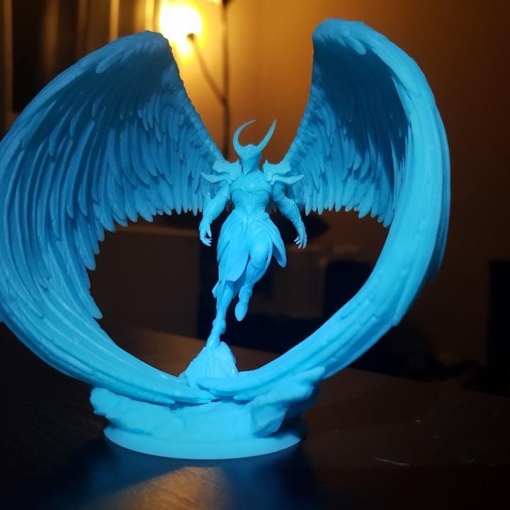 Angel Fighter, a celestial warrior with grand, curved wings, stands poised in elegant armor. With a horned helmet and flowing robes, this divine figure embodies power and grace. A stunning miniature for collectors and fantasy RPG enthusiasts.