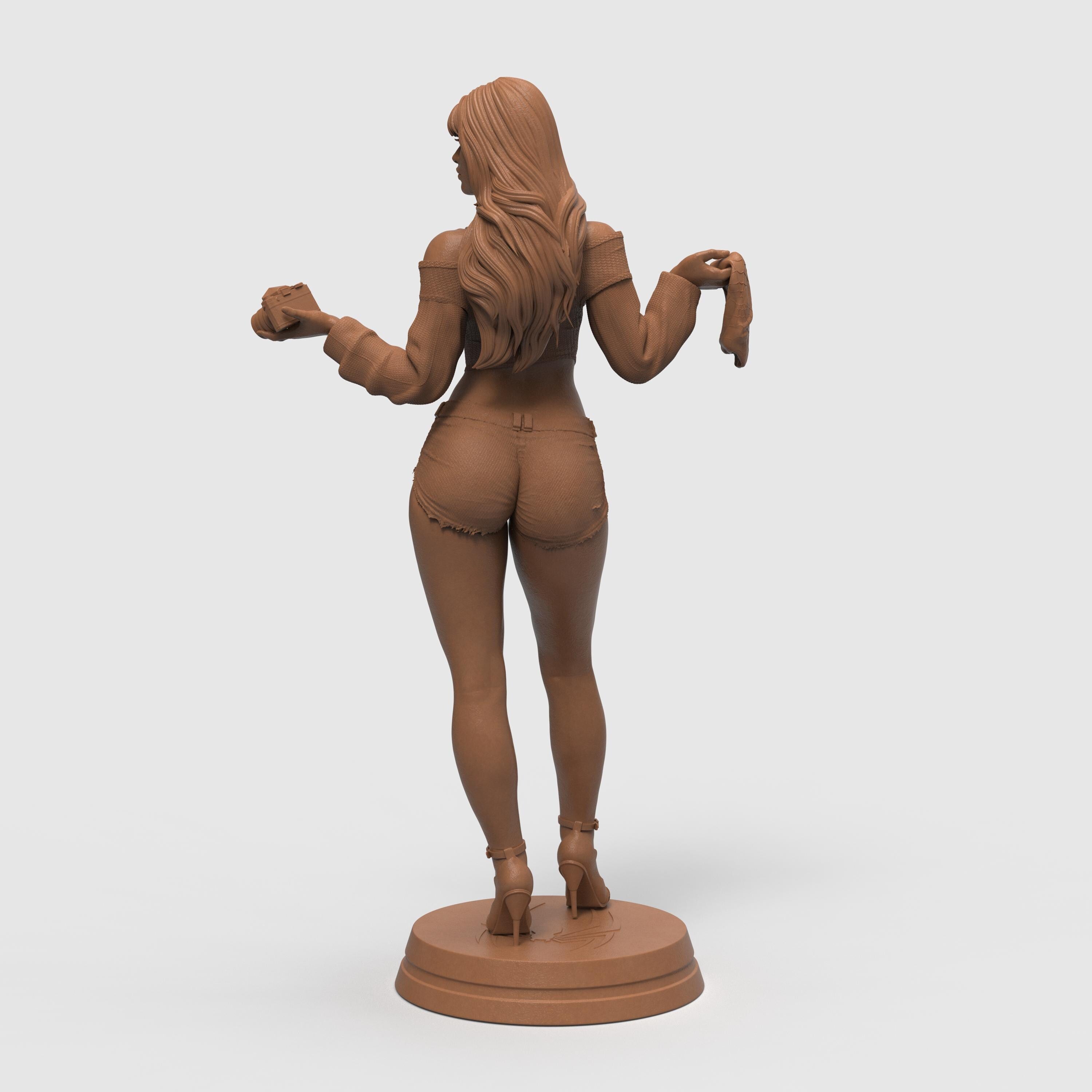 Stylized 3D-printed figurine of Mary Jane in a confident pose, holding a camera in one hand and a cloth in the other. She is dressed in a cropped sweater and short shorts, with long flowing hair and high heels. Available in bronze, gold, and silver finishes, the sculpture showcases fine detail and a modern, fashionable aesthetic.