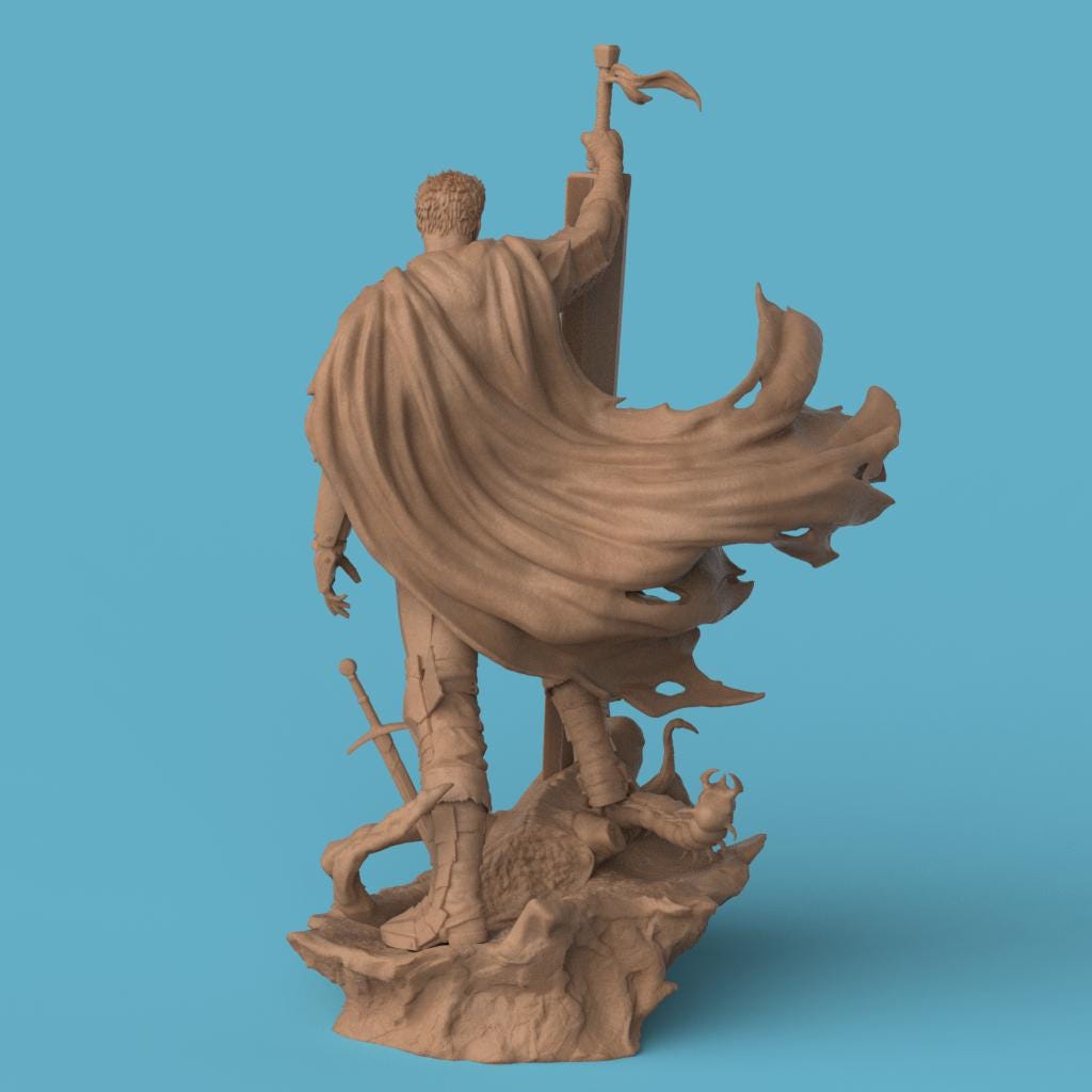 3D-printed Guts figurine featuring a fierce warrior clad in black armor, wielding an enormous sword raised high in victory. The sculpture captures a dramatic moment atop a defeated monster, with a tattered cloak flowing behind him, symbolizing power, resilience, and battle-worn determination.