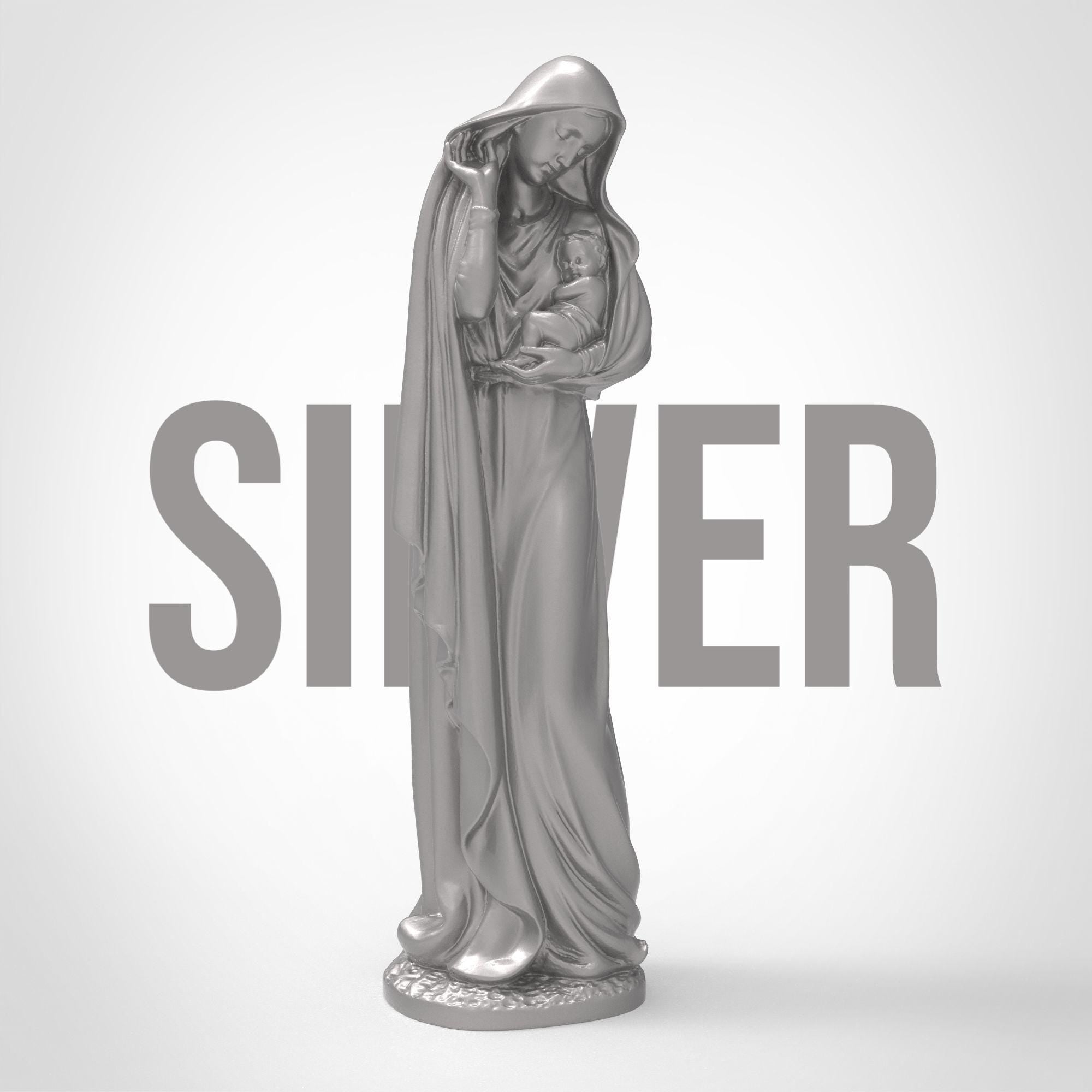 Graceful and serene, this Virgin Mary statuette captures a tender moment of maternal love. Cloaked in flowing robes and cradling baby Jesus, it&#39;s a symbol of purity and peace—perfect for sacred spaces, spiritual gifts, or heartfelt décor.