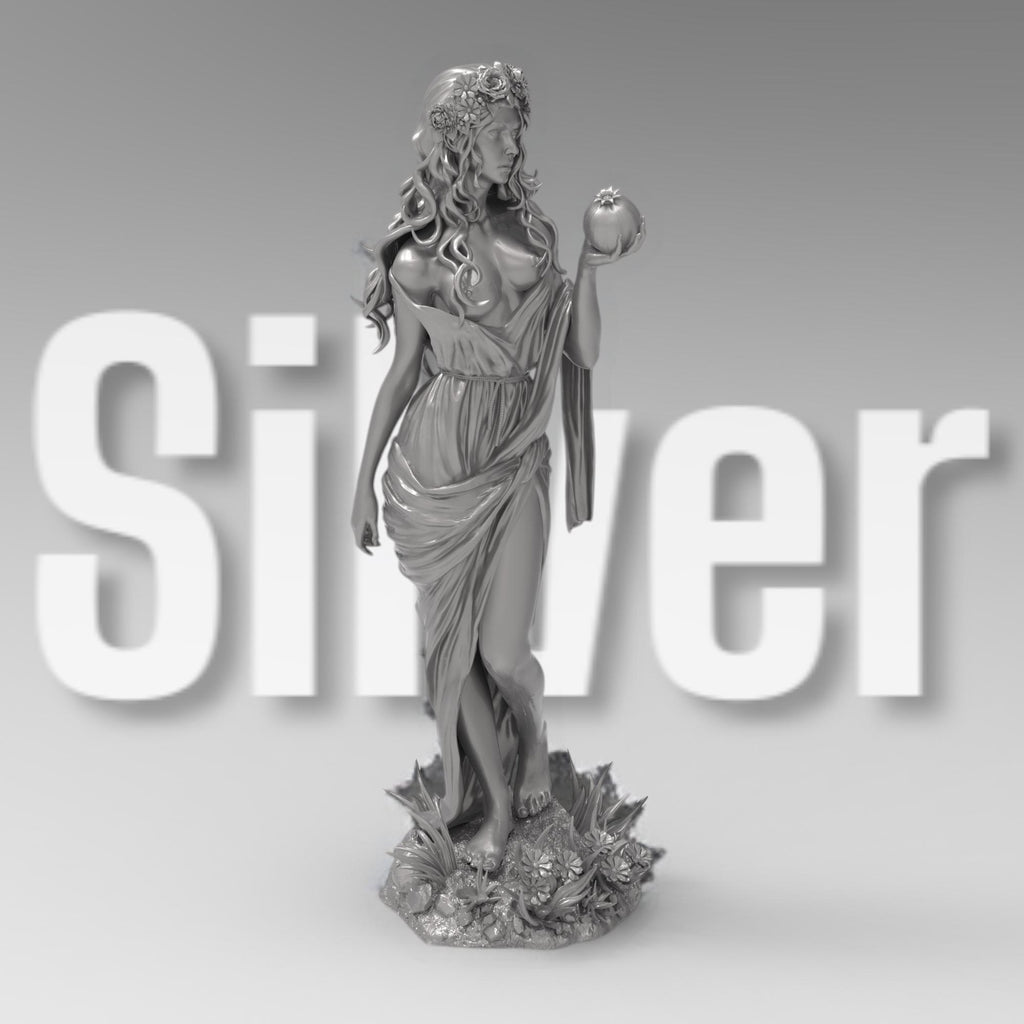 Silver-colored statue of a cowboy on horseback, holding a rope and equipped with a rifle and saddle gear, standing on a rugged base with detailed textures.