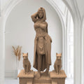 Step into ancient royalty with our Cleopathra sculpture—an enchanting blend of elegance and mystique. Standing poised between two regal felines, she embodies divine power and timeless grace. A stunning centerpiece for lovers of mythology and Egyptian history.