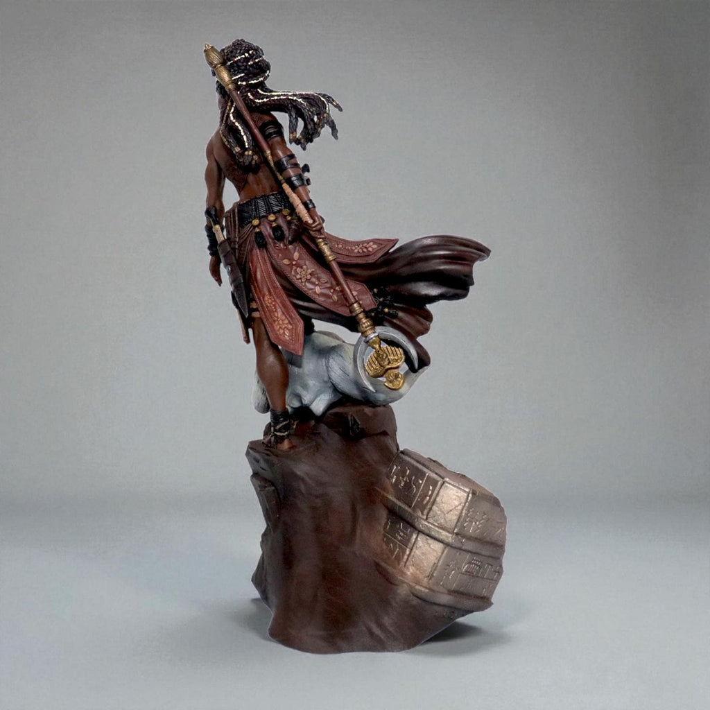 Elzebe, the Warrior Queen, stands atop a rocky skull, exuding strength and regality. Clad in intricate armor, her braided hair flows as she surveys the battlefield. A fierce leader, she embodies resilience and power, a true queen of war and legend.