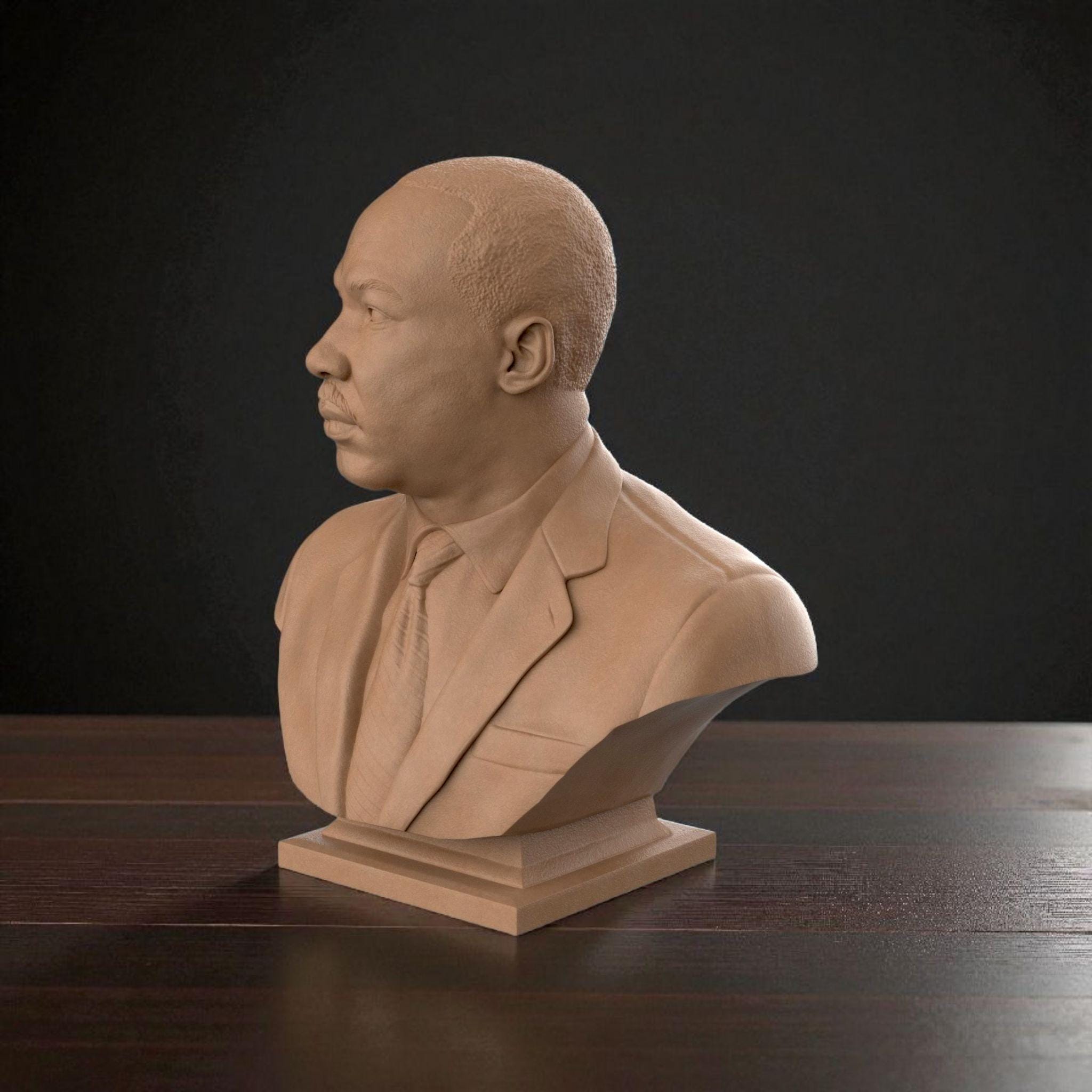 3D-printed bust of Martin Luther King Jr. in a suit and tie, capturing his determined expression with fine detailing, ideal for collectors, tributes, or display décor.