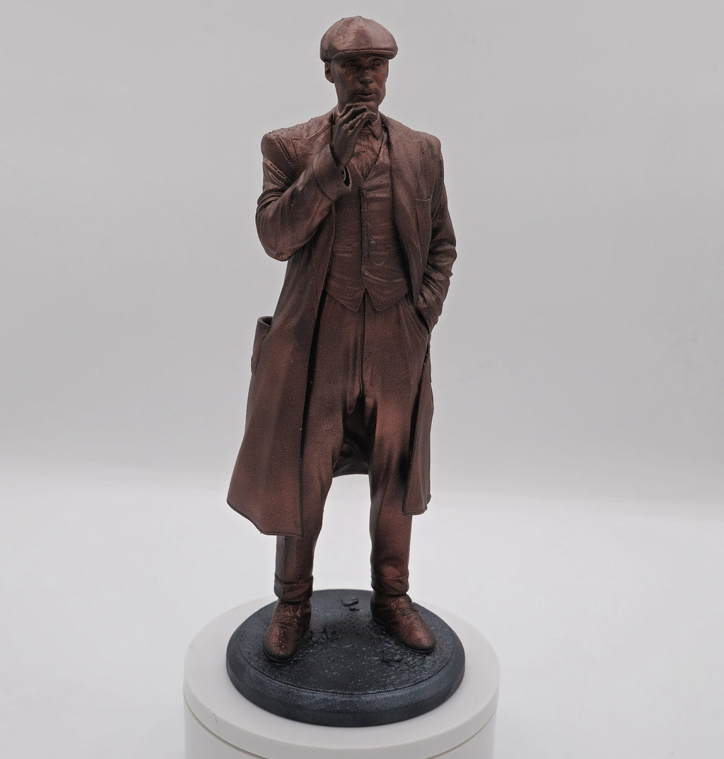 Statue of Thomas Shelby from Peaky Blinders, depicted in a sharp suit and flat cap, exuding his iconic charisma and commanding presence.
