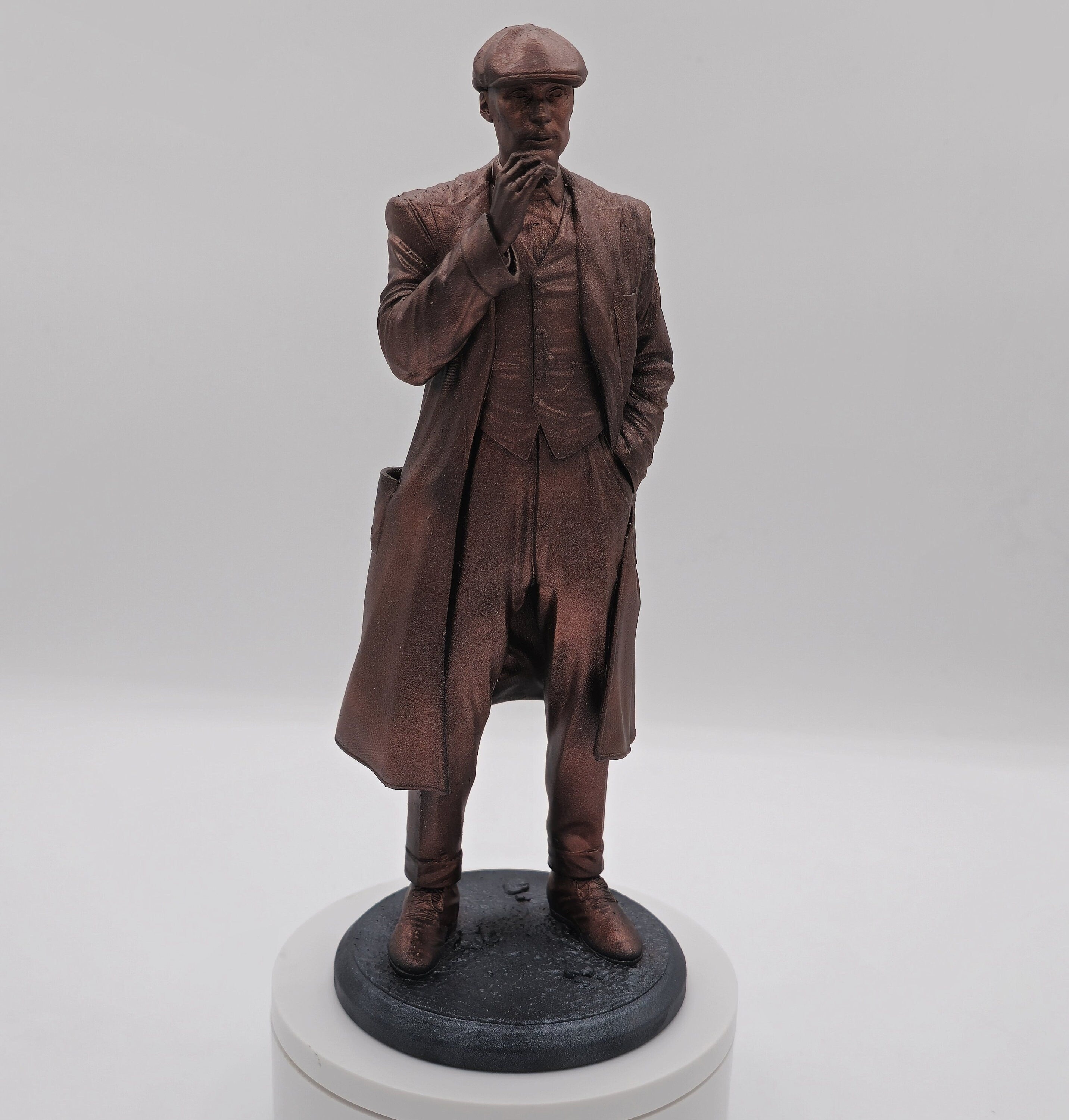 Statue of Thomas Shelby from Peaky Blinders, depicted in a sharp suit and flat cap, exuding his iconic charisma and commanding presence.