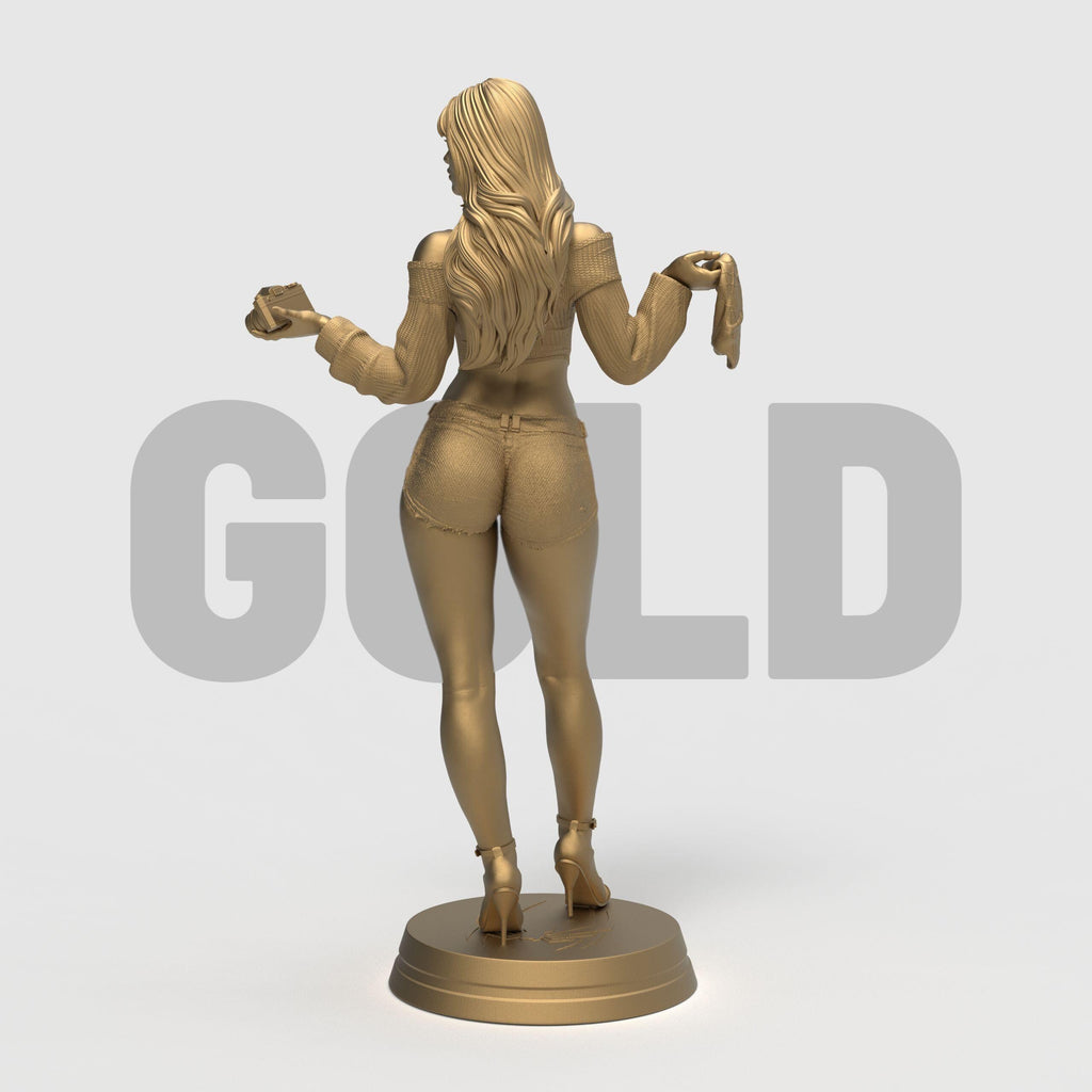 Stylized 3D-printed figurine of Mary Jane in a confident pose, holding a camera in one hand and a cloth in the other. She is dressed in a cropped sweater and short shorts, with long flowing hair and high heels. Available in bronze, gold, and silver finishes, the sculpture showcases fine detail and a modern, fashionable aesthetic.