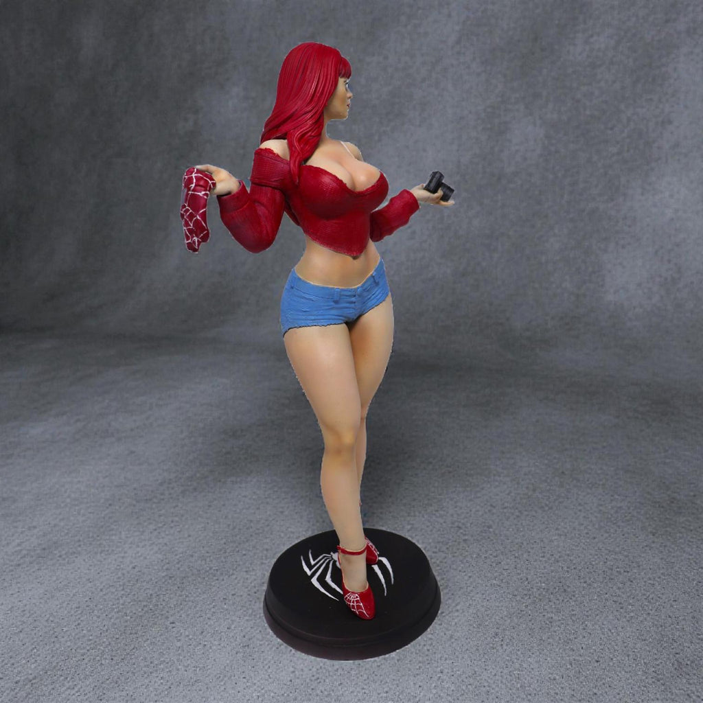 Stylized 3D-printed figurine of Mary Jane in a confident pose, holding a camera in one hand and a cloth in the other. She is dressed in a cropped sweater and short shorts, with long flowing hair and high heels. Available in bronze, gold, and silver finishes, the sculpture showcases fine detail and a modern, fashionable aesthetic.