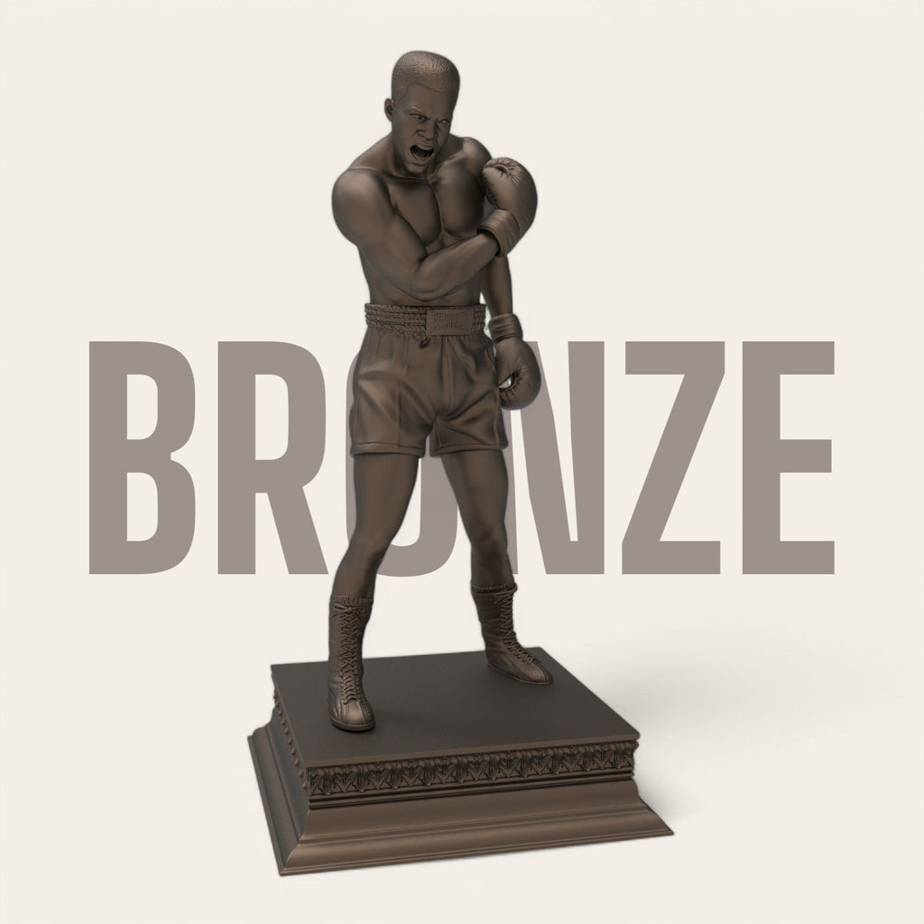 A bold tribute to the greatest of all time—this Muhammad Ali sculpture captures the raw strength and iconic energy of the boxing legend. With gloves raised and stance powerful, it’s a perfect piece for fans, collectors, and champions at heart. Available in gold and bronze finishes.