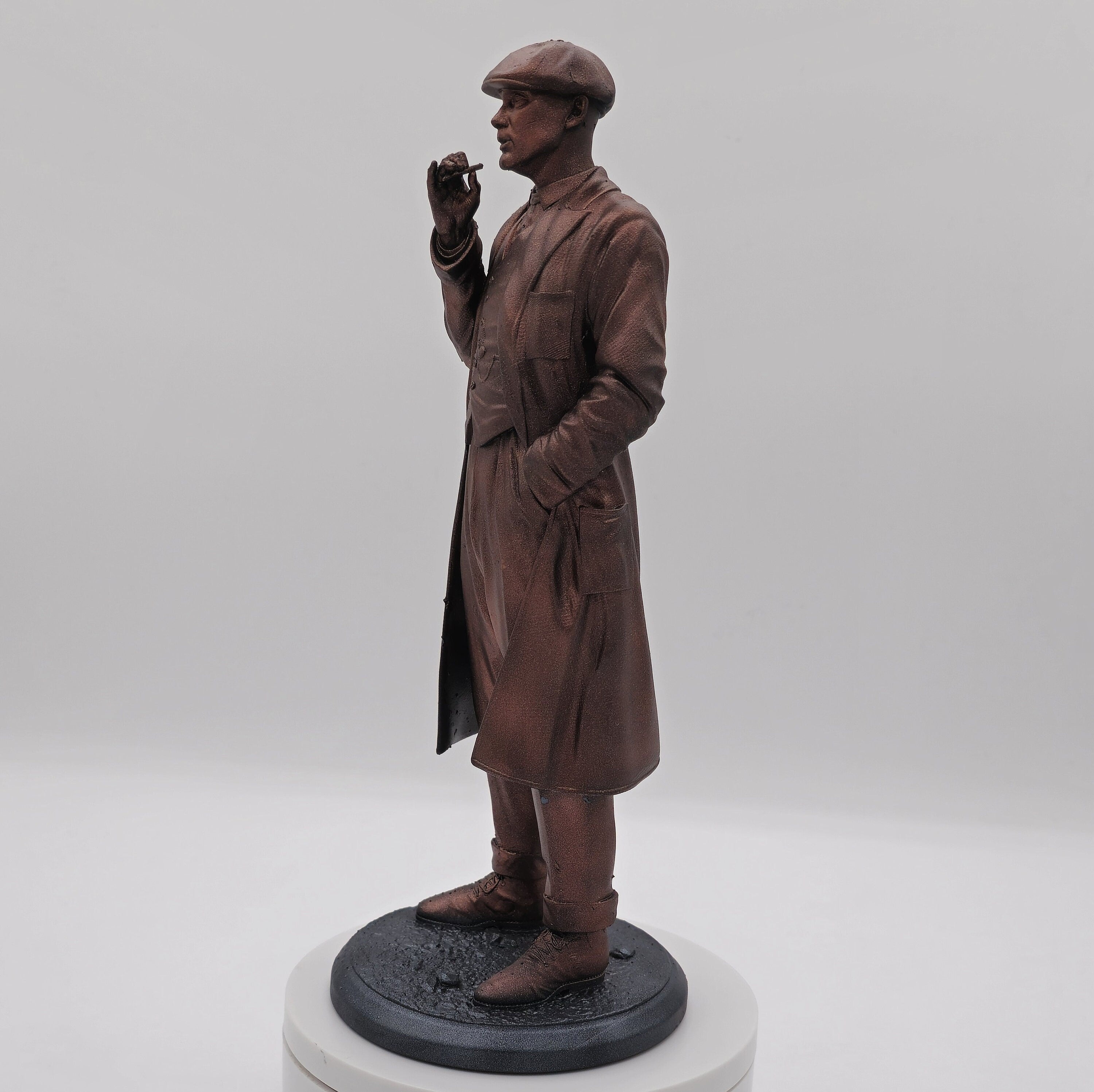Statue of Thomas Shelby from Peaky Blinders, depicted in a sharp suit and flat cap, exuding his iconic charisma and commanding presence.