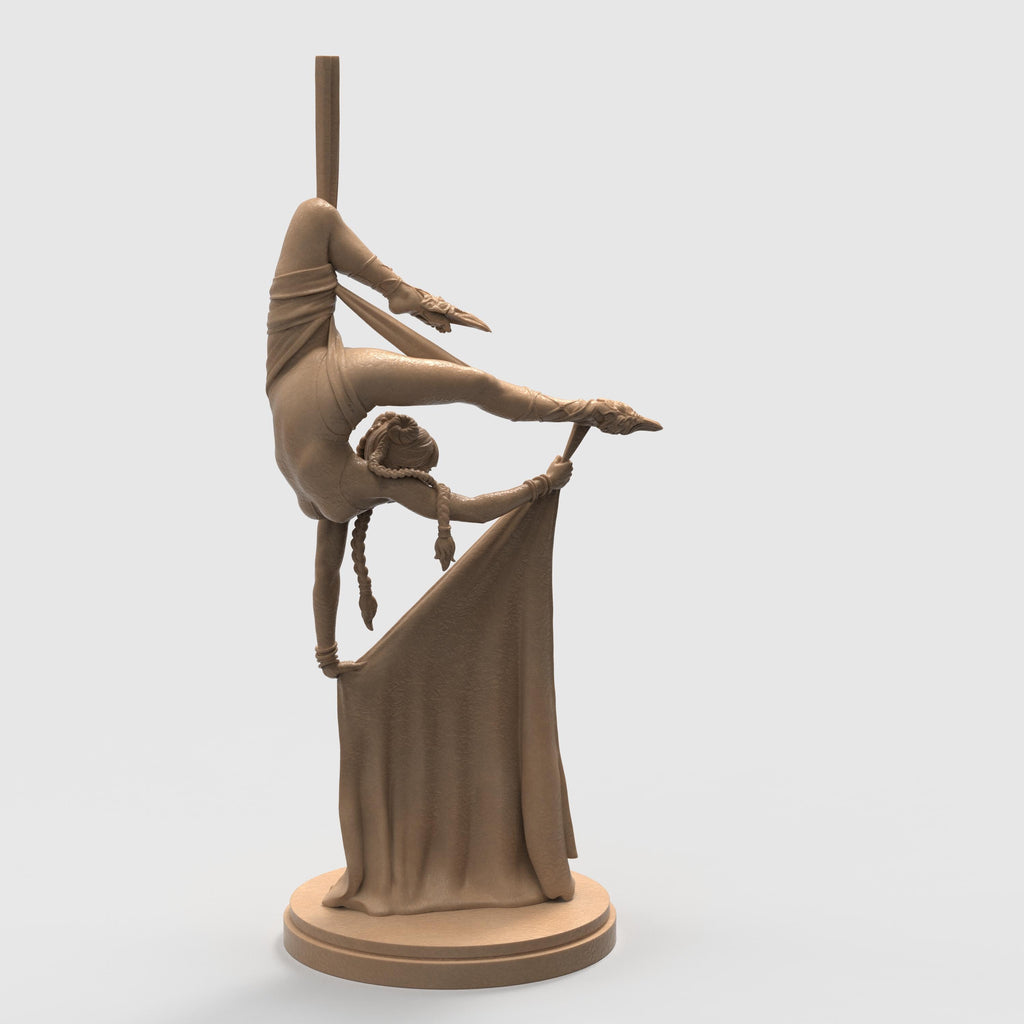 A breathtaking sculpture capturing the grace of aerial dance. The Dreamwoven balances midair, holding silken fabric in an elegant, contorted pose. Every curve and detail tells a story of strength, beauty, and poise—perfect for lovers of motion, fantasy, and fine artistry.