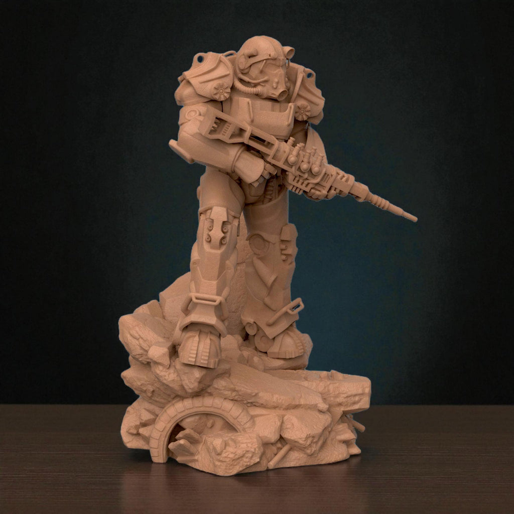 3D-printed T-60 Power Armor figurine featuring a heavily armored soldier standing on a rocky base. The detailed design showcases metallic plating, mechanical joints, and a futuristic energy weapon — a perfect collectible for sci-fi fans and post-apocalyptic enthusiasts.