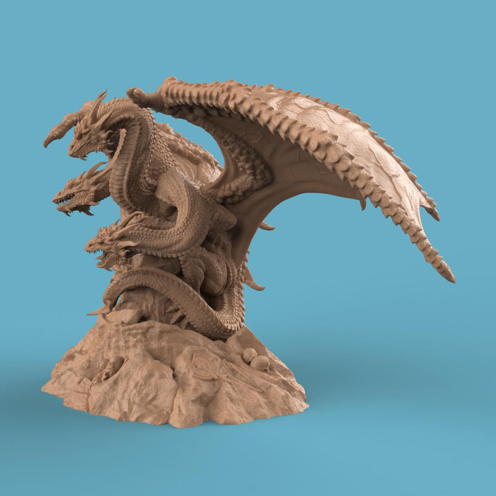 3D-printed Tridracarys Sovereign Dragon miniature featuring a three-headed dragon perched atop jagged rocks, wings spread wide and scales intricately detailed. A striking fantasy centerpiece for tabletop gaming or display.