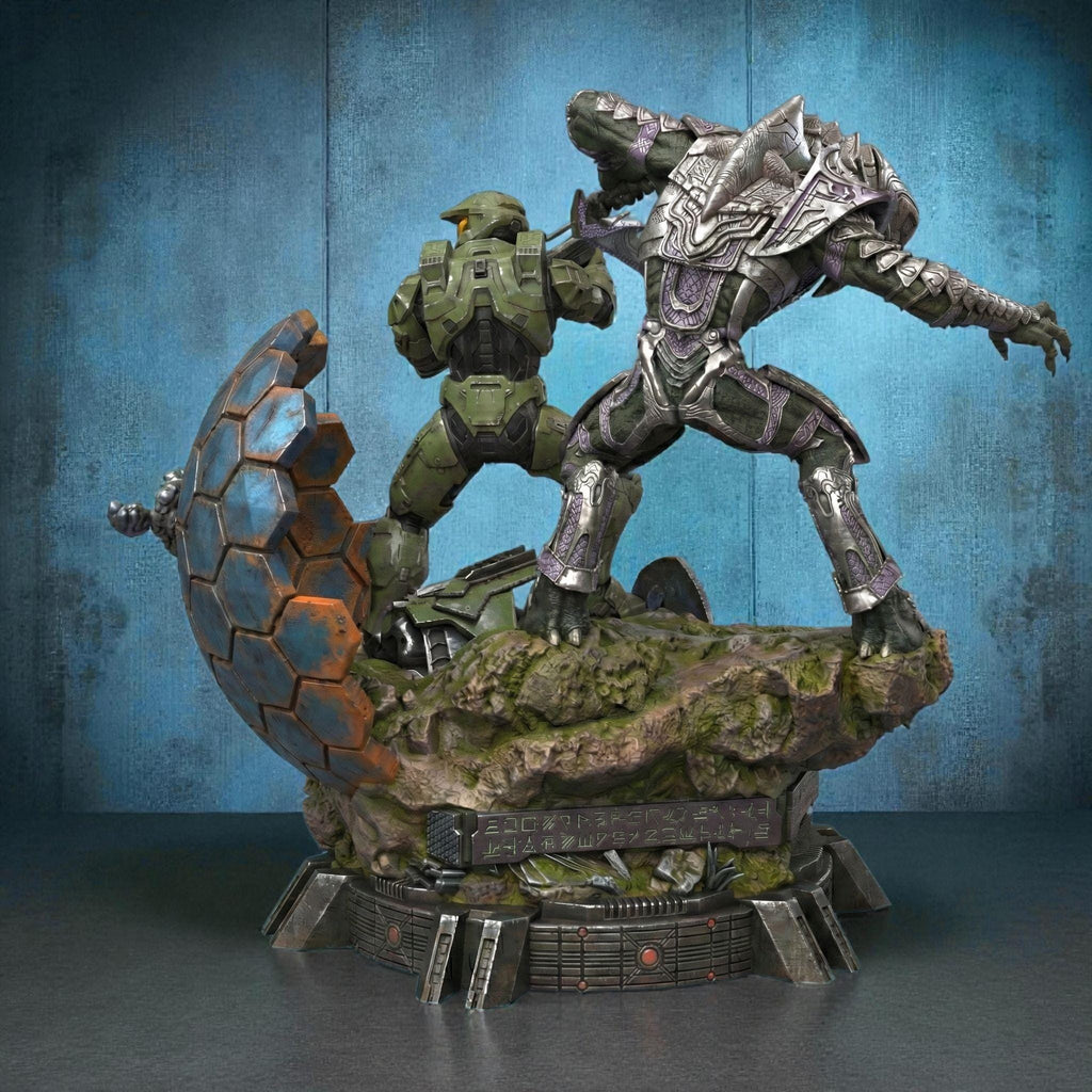 3D-printed diorama featuring the Arbiter and Master Chief locked in battle, captured in dynamic motion. The detailed scene showcases the two armored warriors clashing atop a sci-fi terrain with glowing energy blades and futuristic textures, embodying heroism, rivalry, and cinematic intensity — a perfect collectible for sci-fi fans and gamers.