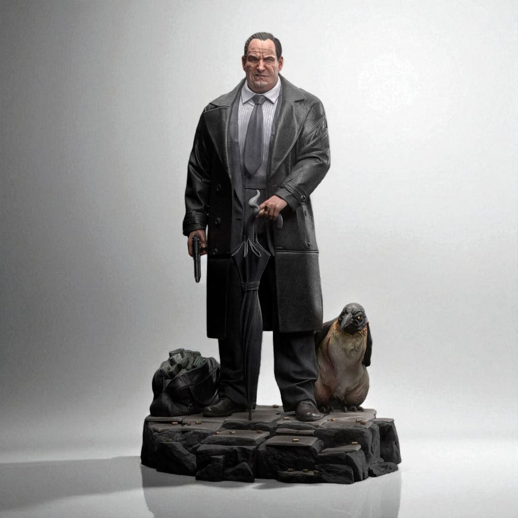 3D-printed figurine of The Penguin Man standing on a textured stone base, holding an umbrella and a gun, with two penguins by his side. The sculpture showcases detailed clothing folds and facial expression, making it ideal for collectors of cinematic or villain-inspired art pieces.