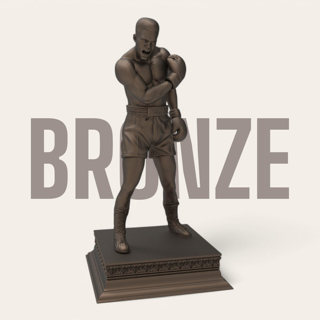 A bold tribute to the greatest of all time—this Muhammad Ali sculpture captures the raw strength and iconic energy of the boxing legend. With gloves raised and stance powerful, it’s a perfect piece for fans, collectors, and champions at heart. Available in gold and bronze finishes.